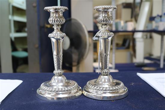 A pair of George III silver candlesticks, by Matthew Boulton, Birmingham 1808, loaded bases, h. 19.5cm